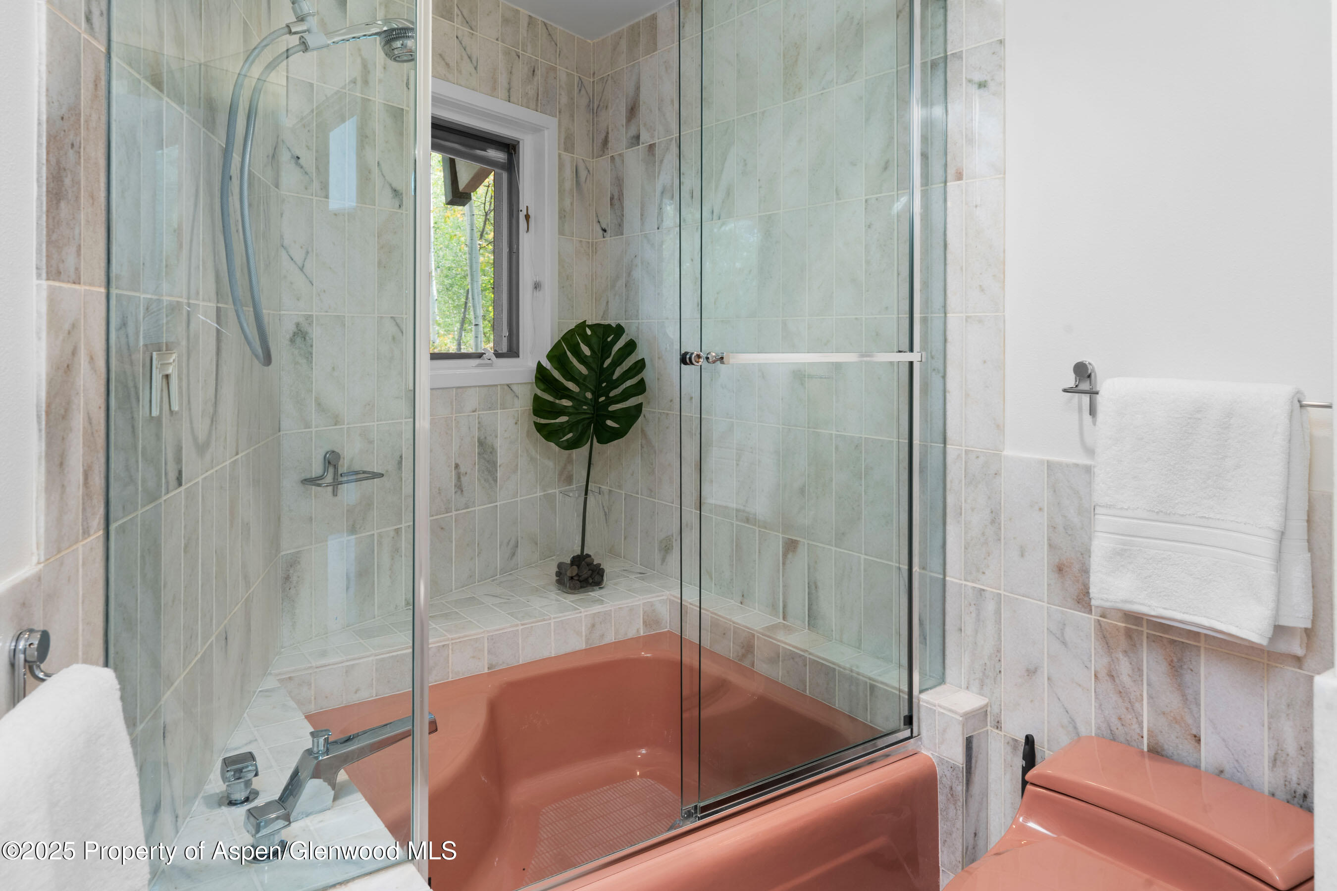 239 Antler Ridge Lane Snowmass Village, CO 81615 - Photo 27 of 50 a bath tub sitting next to a bathroom sink