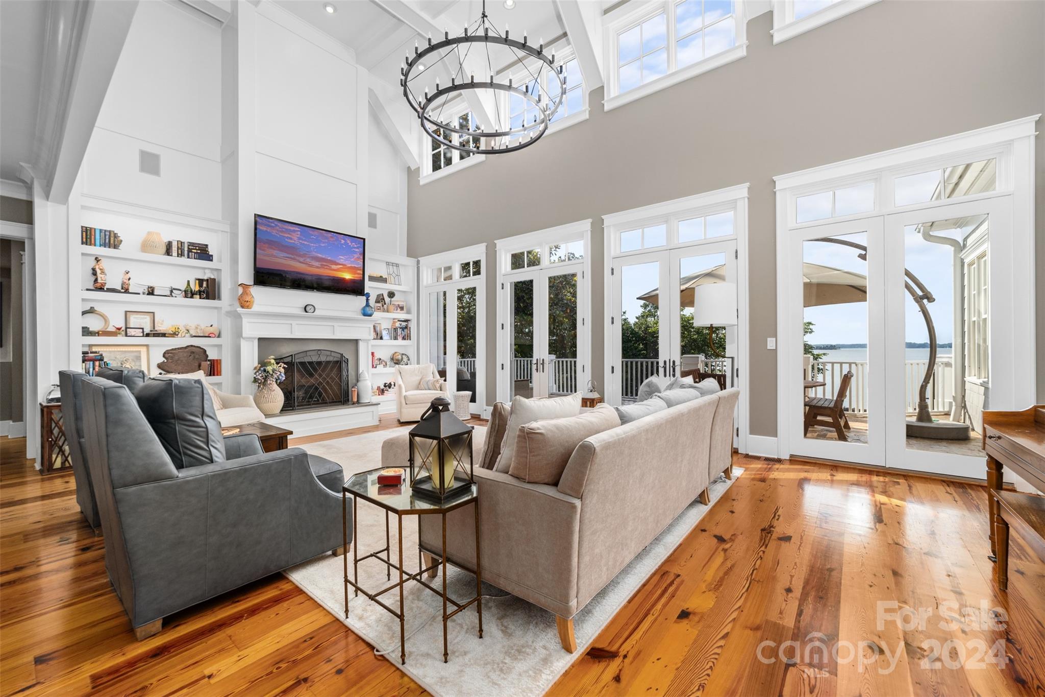 15515 Jetton Road Cornelius, NC 28031 - Photo 14 of 48 a living room with furniture fireplace and flat screen tv