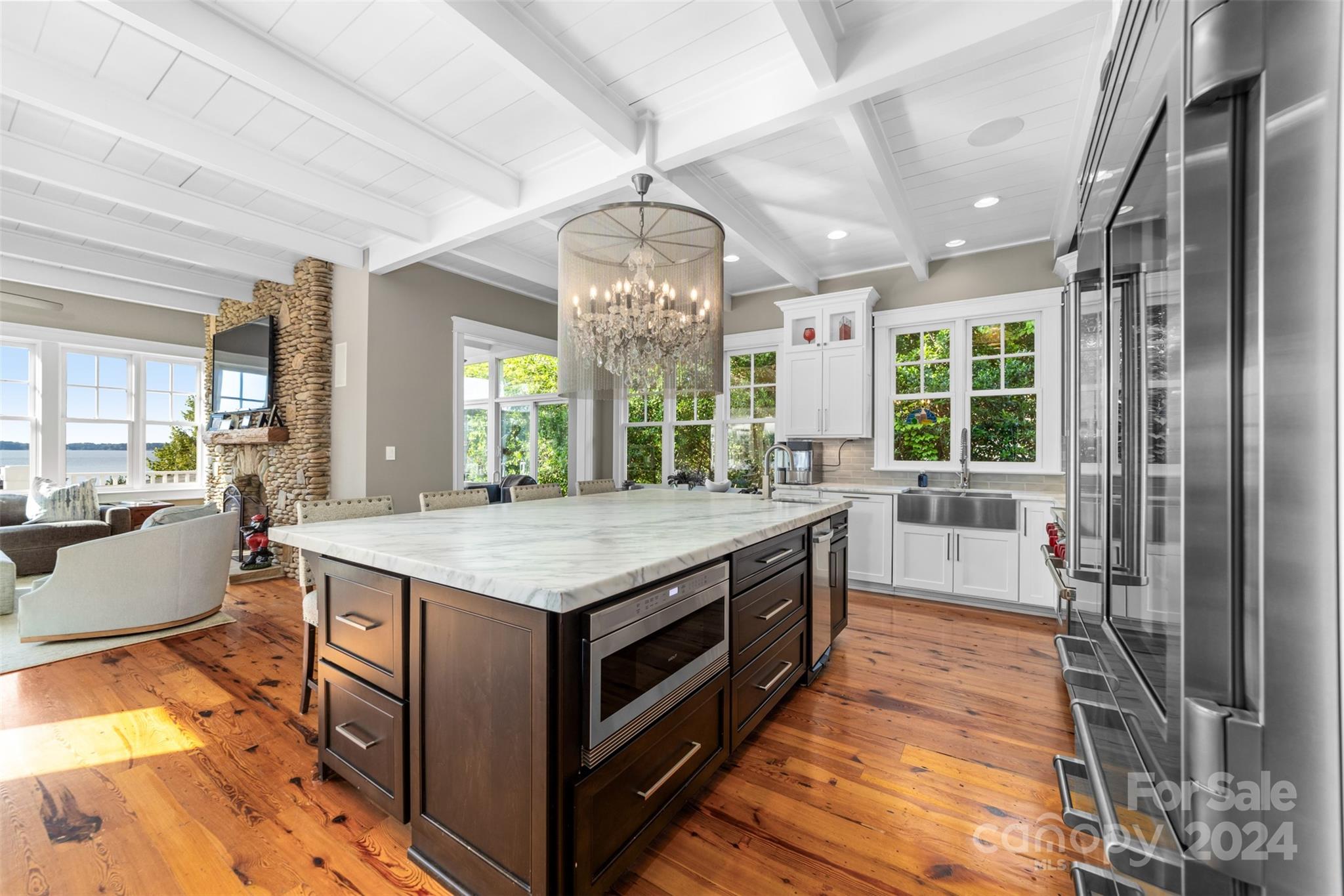 15515 Jetton Road Cornelius, NC 28031 - Photo 17 of 48 a kitchen with a stove and a large window