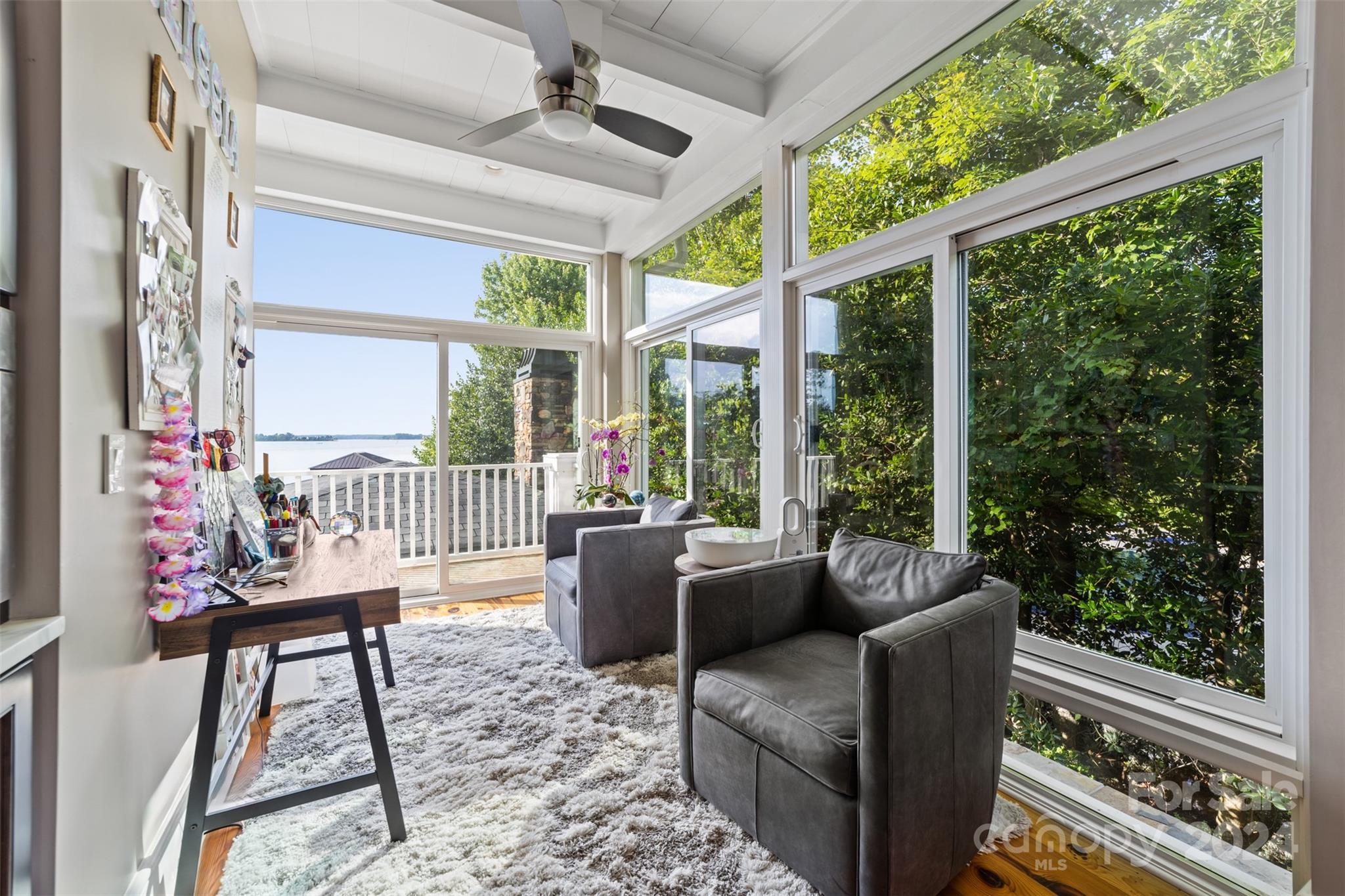 15515 Jetton Road Cornelius, NC 28031 - Photo 19 of 48 a living room with furniture and a large window
