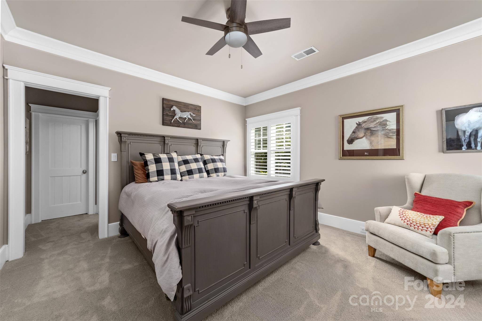 15515 Jetton Road Cornelius, NC 28031 - Photo 25 of 48 a bed room with a bed and a couch