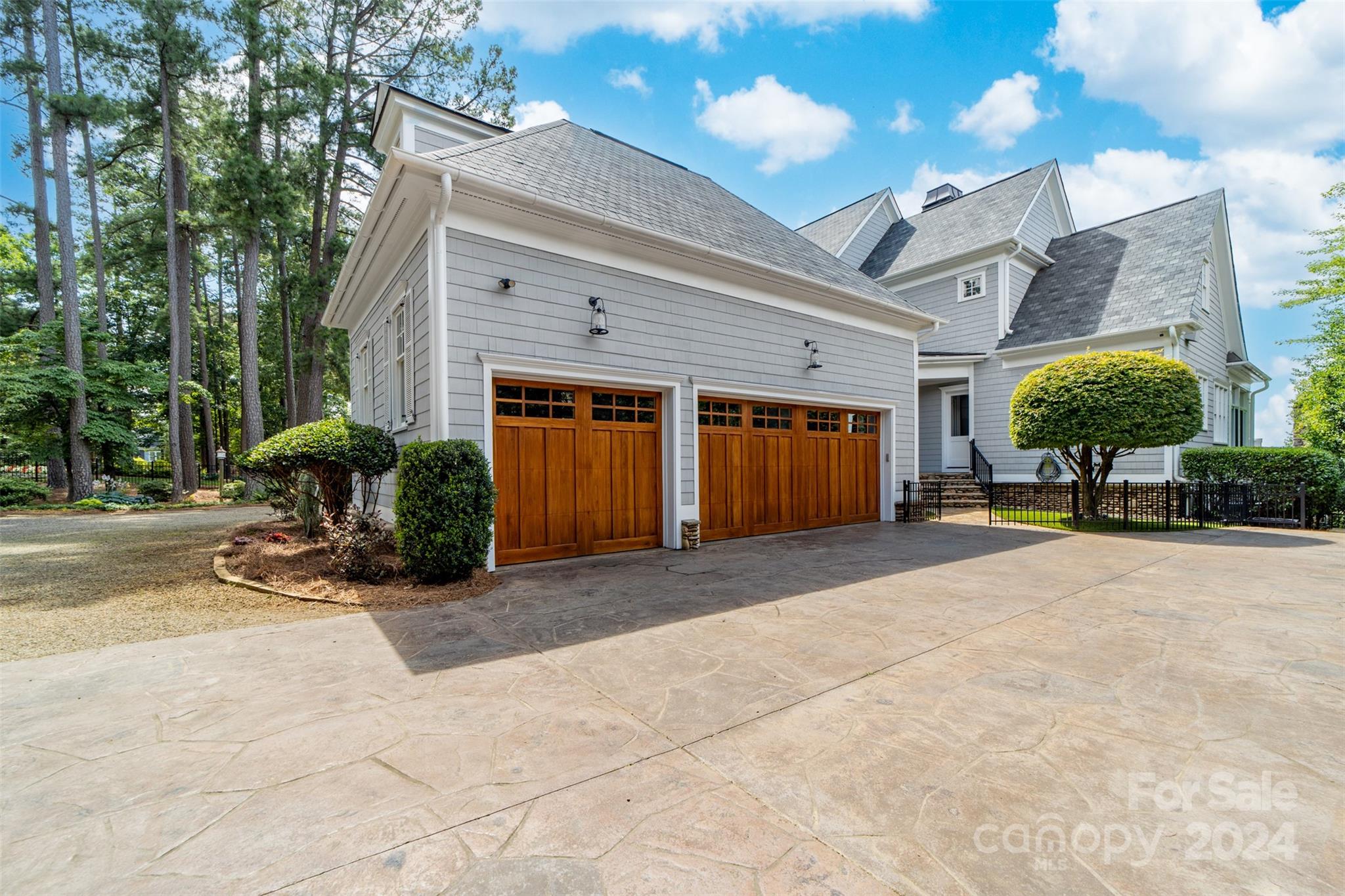 15515 Jetton Road Cornelius, NC 28031 - Photo 43 of 48 a view of a house with sitting area and potted plants