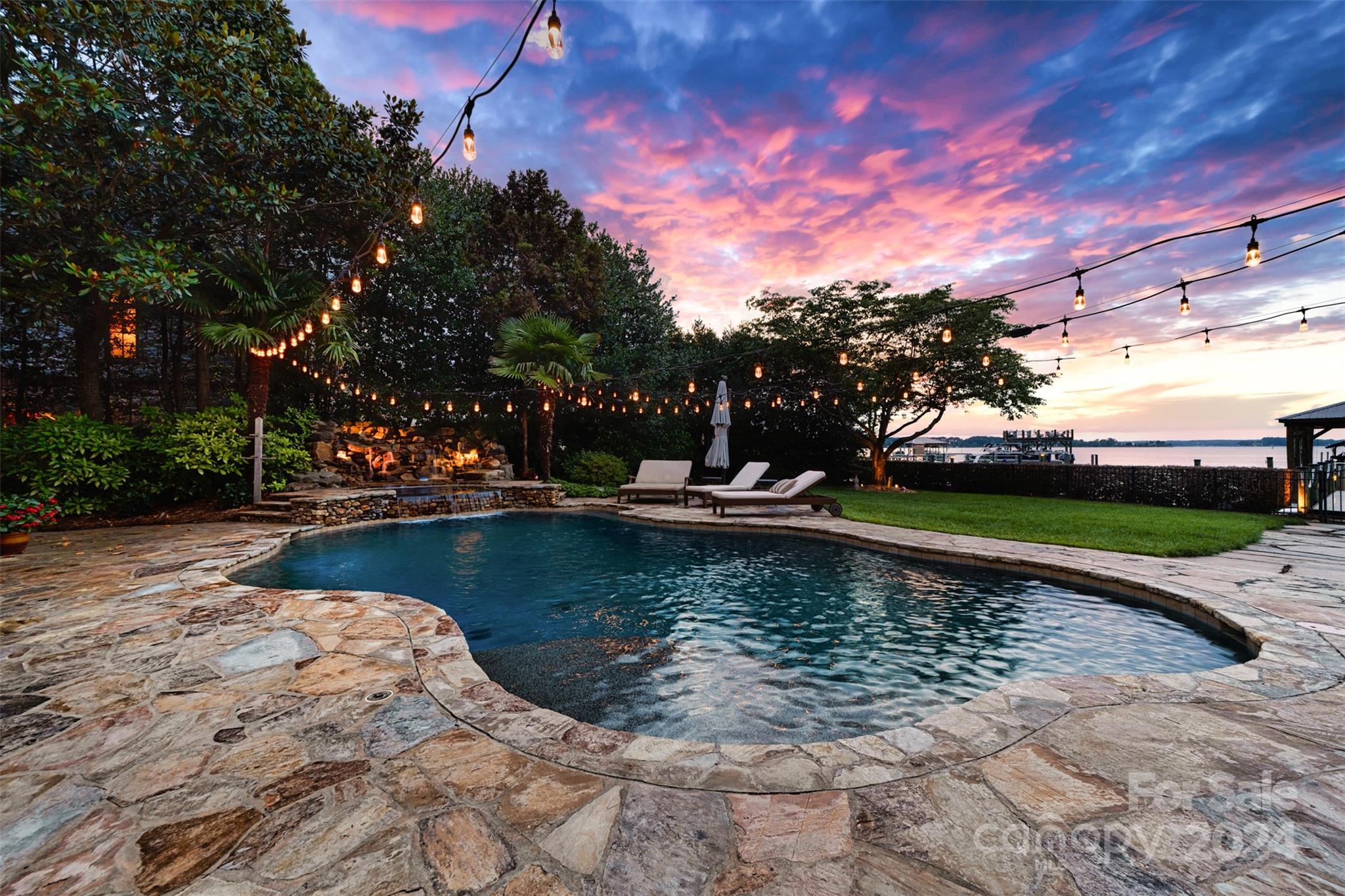 15515 Jetton Road Cornelius, NC 28031 - Photo 48 of 48 a view of a swimming pool with a yard