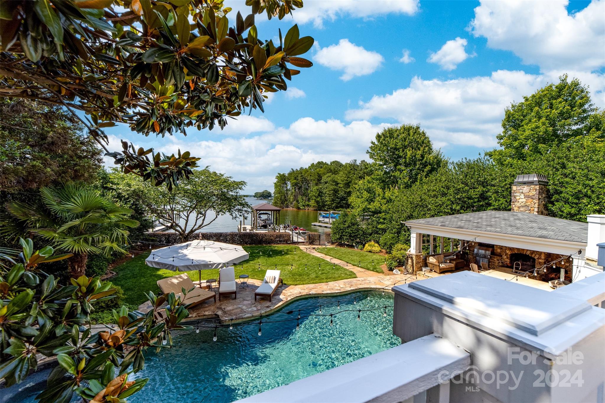 15515 Jetton Road Cornelius, NC 28031 - Photo 5 of 48 an aerial view of a house with yard and swimming pool