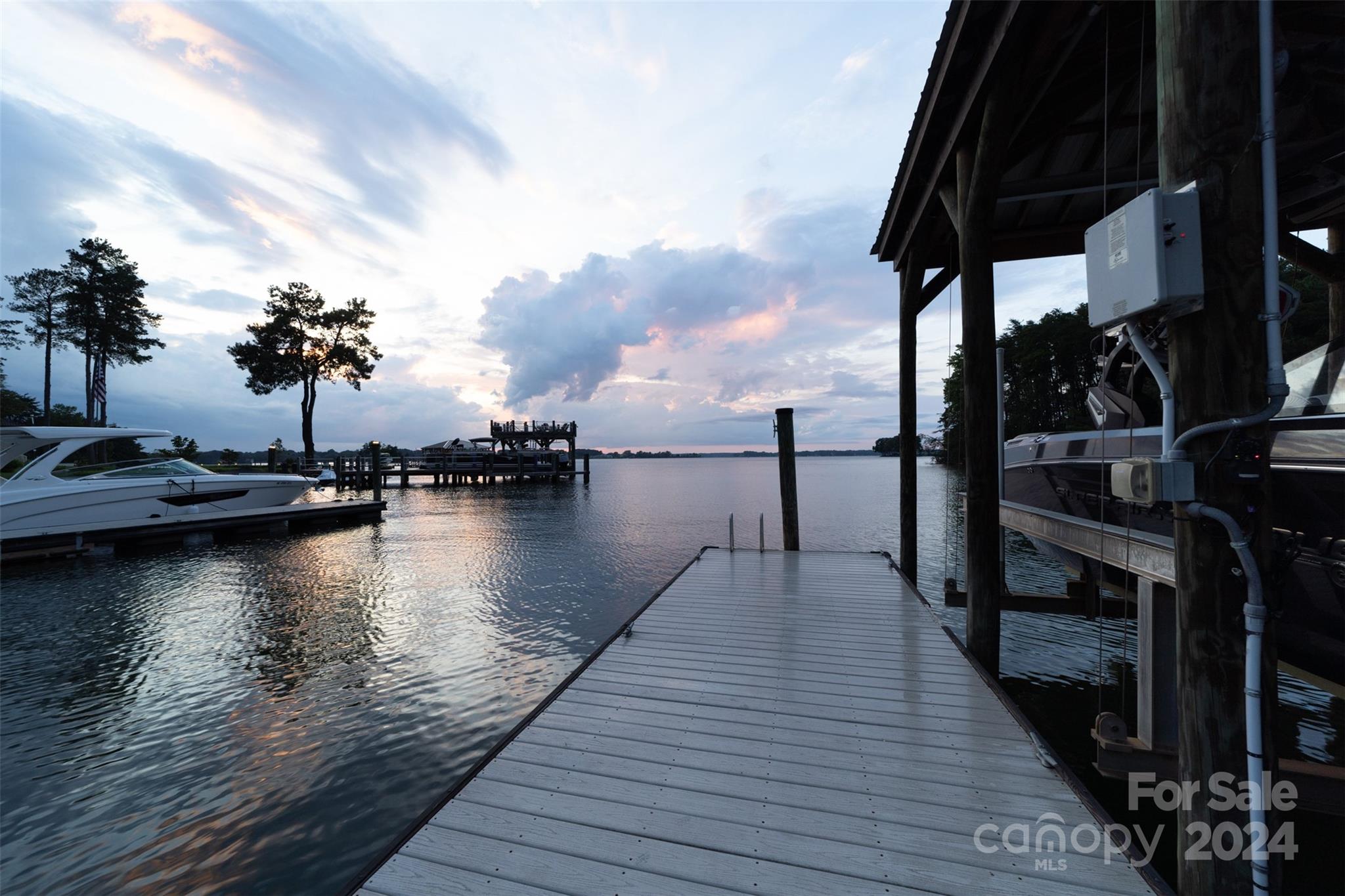 15515 Jetton Road Cornelius, NC 28031 - Photo 9 of 48 a view of a lake with boats and wooden floor