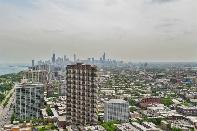 655 West Irving Park Road, Unit 5311 Chicago, IL 60613 - Photo 10 of 10 a view of a city with tall buildings