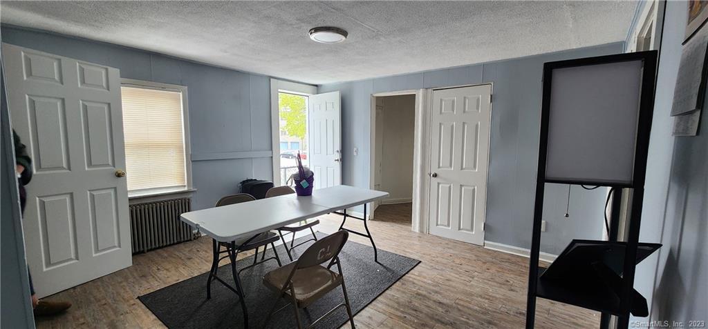 60 Jay Street New London, CT 06320 - Photo 12 of 17 a view of a a dining room with furniture window and wooden floor