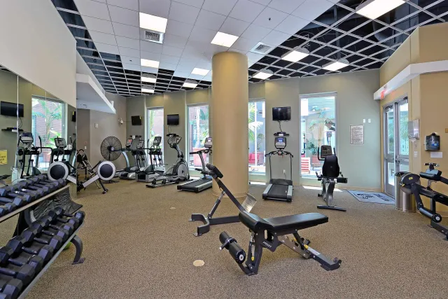 a very nice looking dining room with a large table and chairs