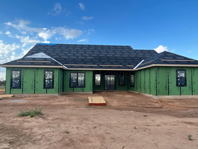 a front view of a house with entertaining space