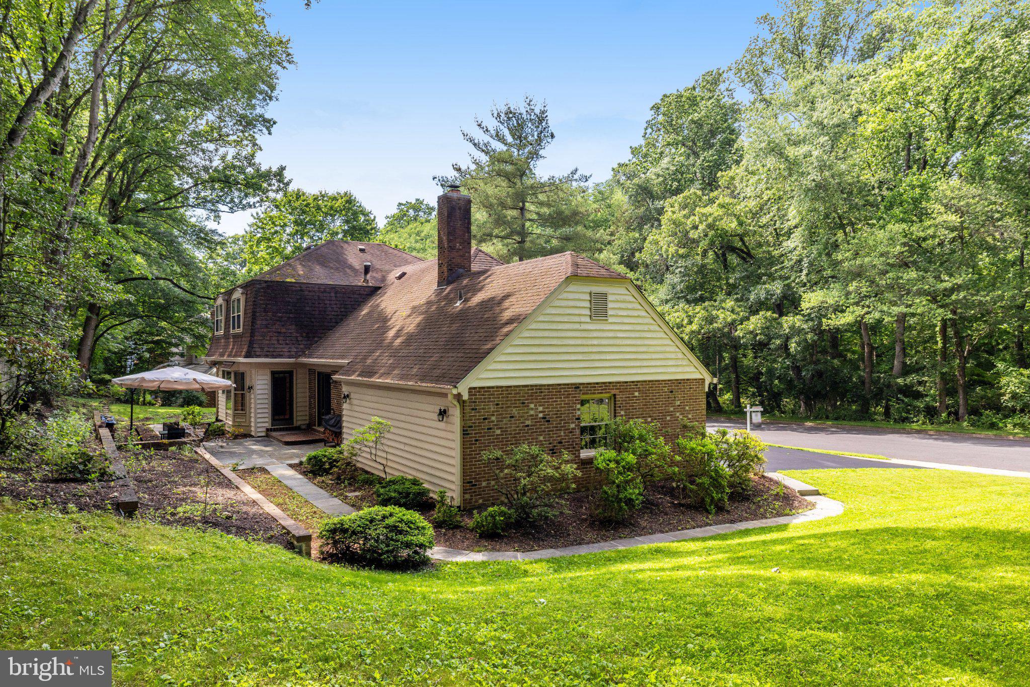 1427 Laurel Hill Road Vienna, VA 22182 - Photo 54 of 57 Charming home nestled in lush greenery.