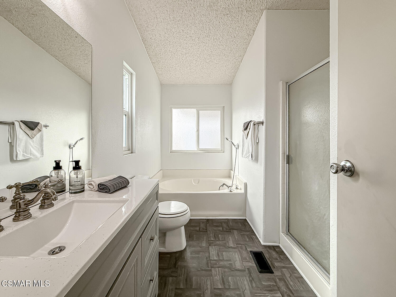 250 East Telegraph Road, Unit 248 Fillmore, CA 93015 - Photo 16 of 42 a bathroom with a sink a toilet a mirror and shower