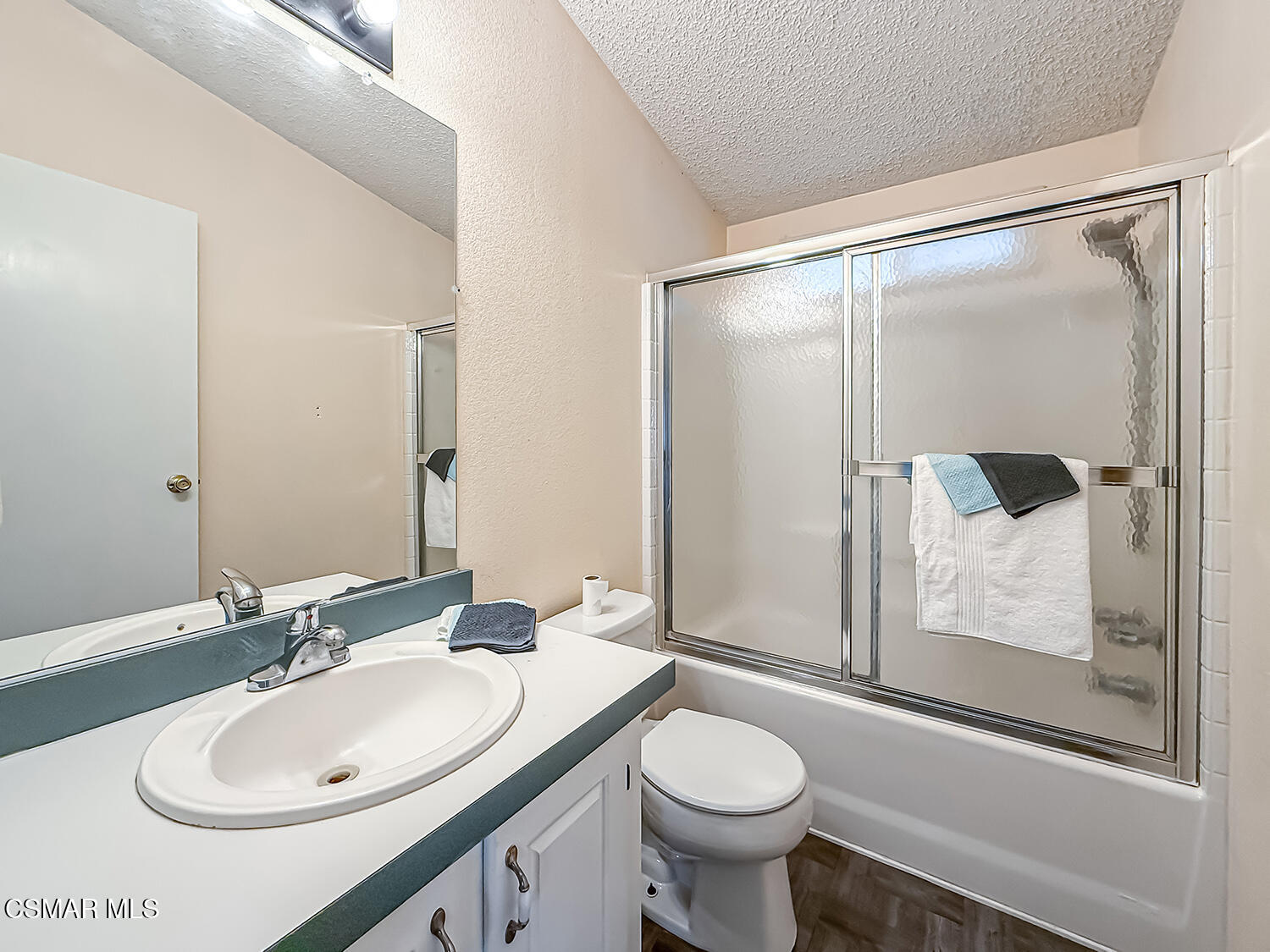 250 East Telegraph Road, Unit 248 Fillmore, CA 93015 - Photo 20 of 42 a bathroom with a sink and a mirror