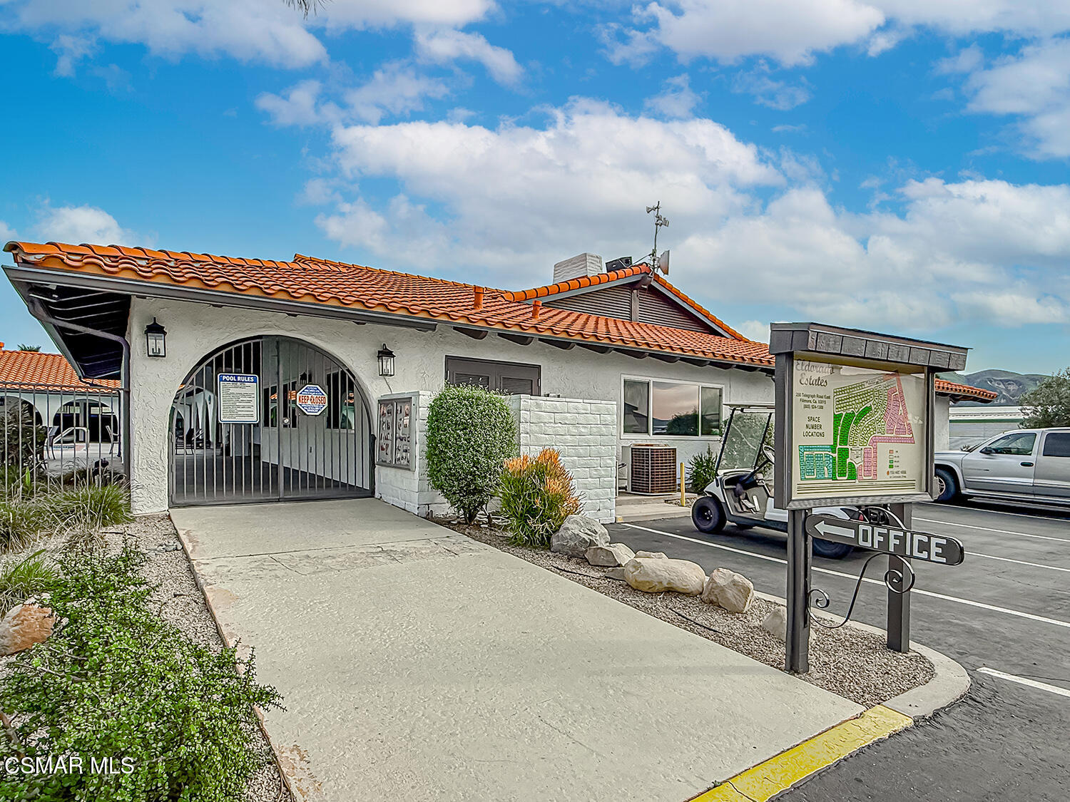 250 East Telegraph Road, Unit 248 Fillmore, CA 93015 - Photo 26 of 42 a front view of a house with garden