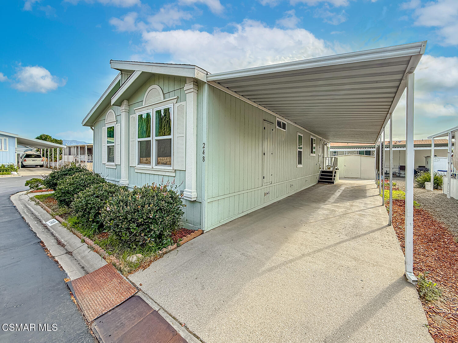 250 East Telegraph Road, Unit 248 Fillmore, CA 93015 - Photo 36 of 42 a view of a house with a small yard