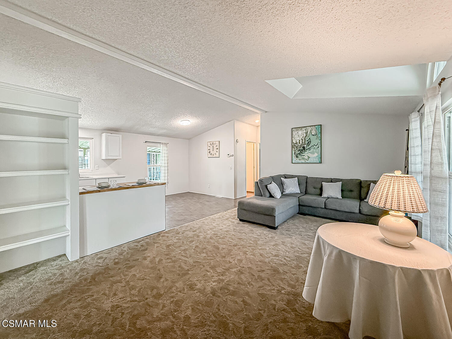 250 East Telegraph Road, Unit 248 Fillmore, CA 93015 - Photo 6 of 42 a living room with furniture and a couch
