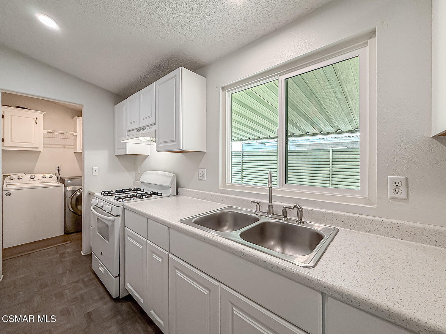 250 East Telegraph Road, Unit 248 Fillmore, CA 93015 - Photo 9 of 42 cKitchen and Laundry1