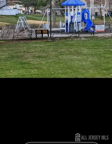 a view of swimming pool with outdoor space and seating area