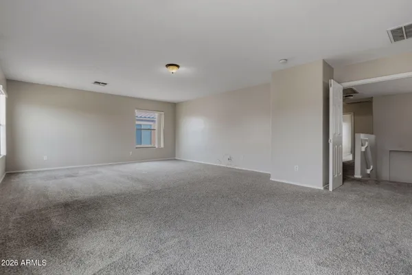 a view of a livingroom with a staircase