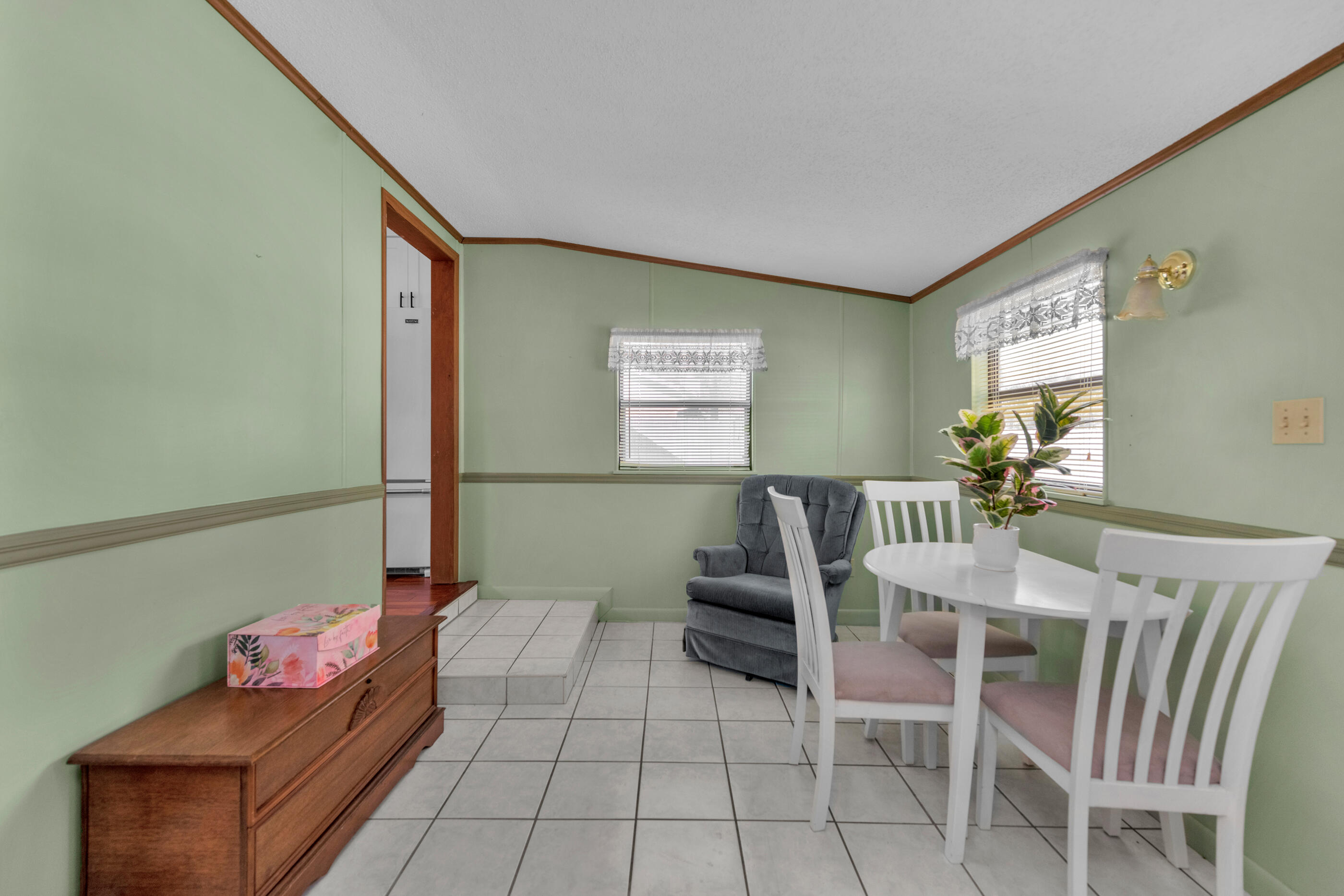 371 Echo Circle Fort Walton Beach, FL 32548 - Photo 12 of 36 a dining room with furniture and window