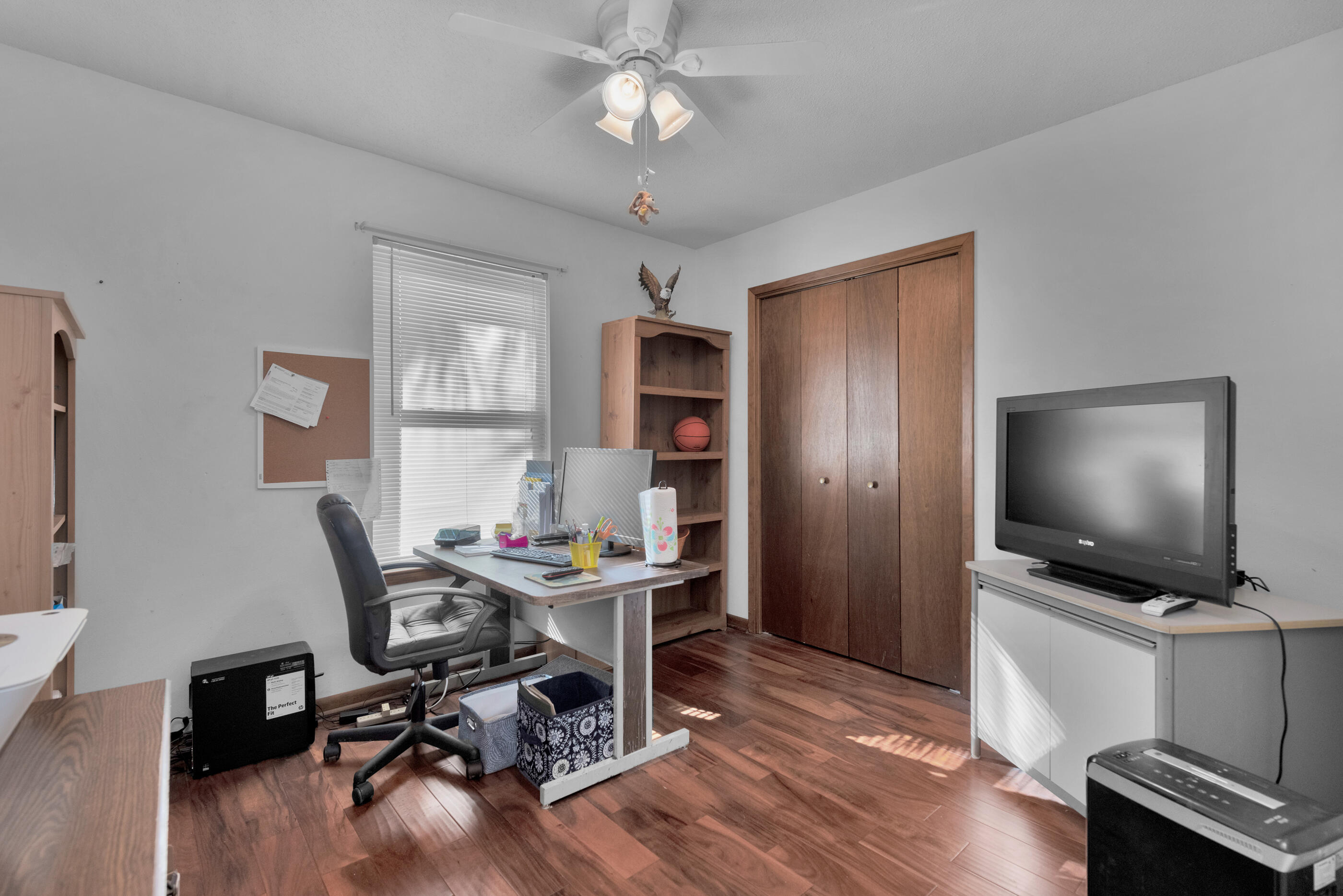 371 Echo Circle Fort Walton Beach, FL 32548 - Photo 20 of 36 a view of a workspace with furniture and a window