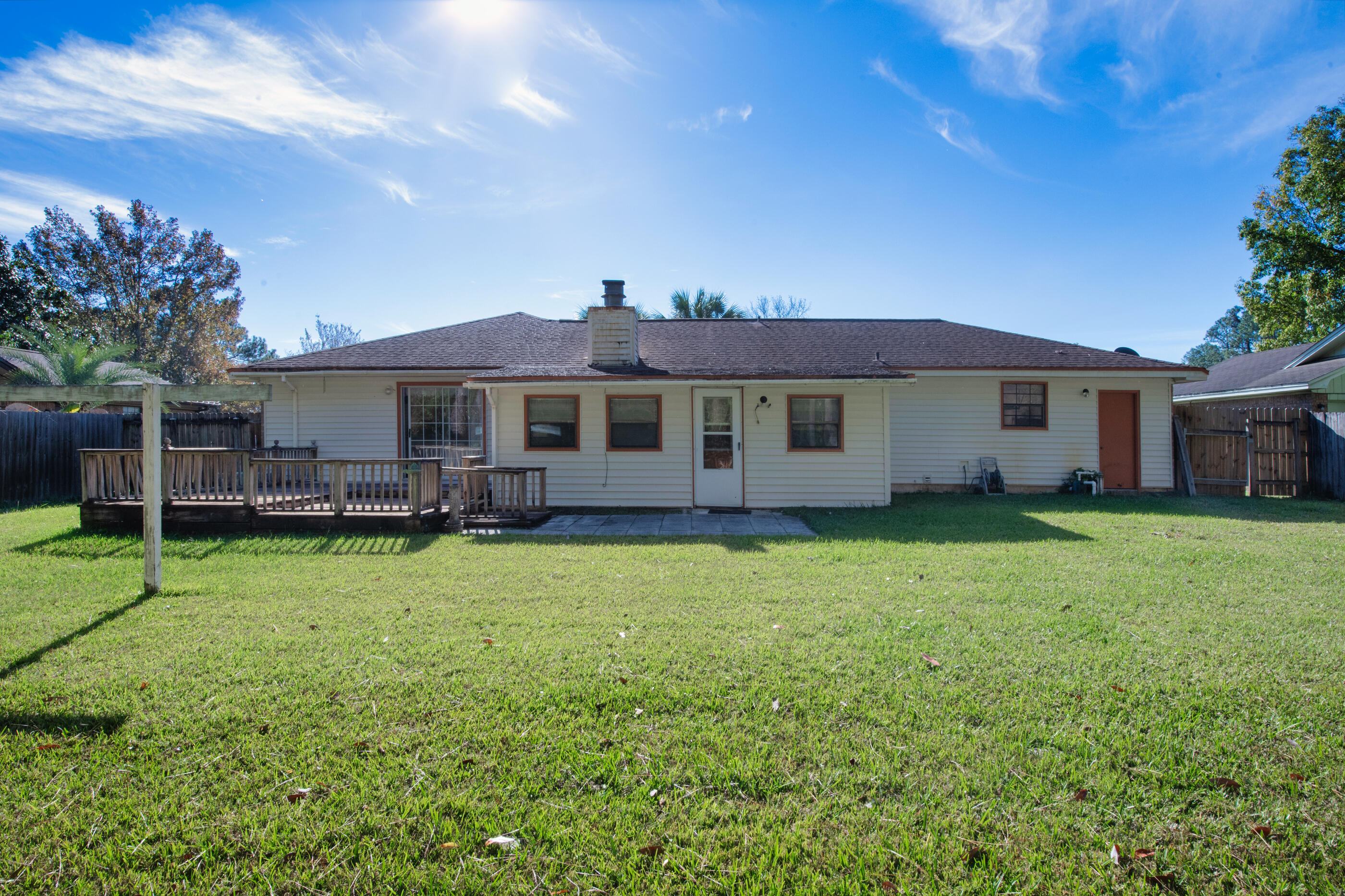 371 Echo Circle Fort Walton Beach, FL 32548 - Photo 2 of 36 a view of a house with a backyard
