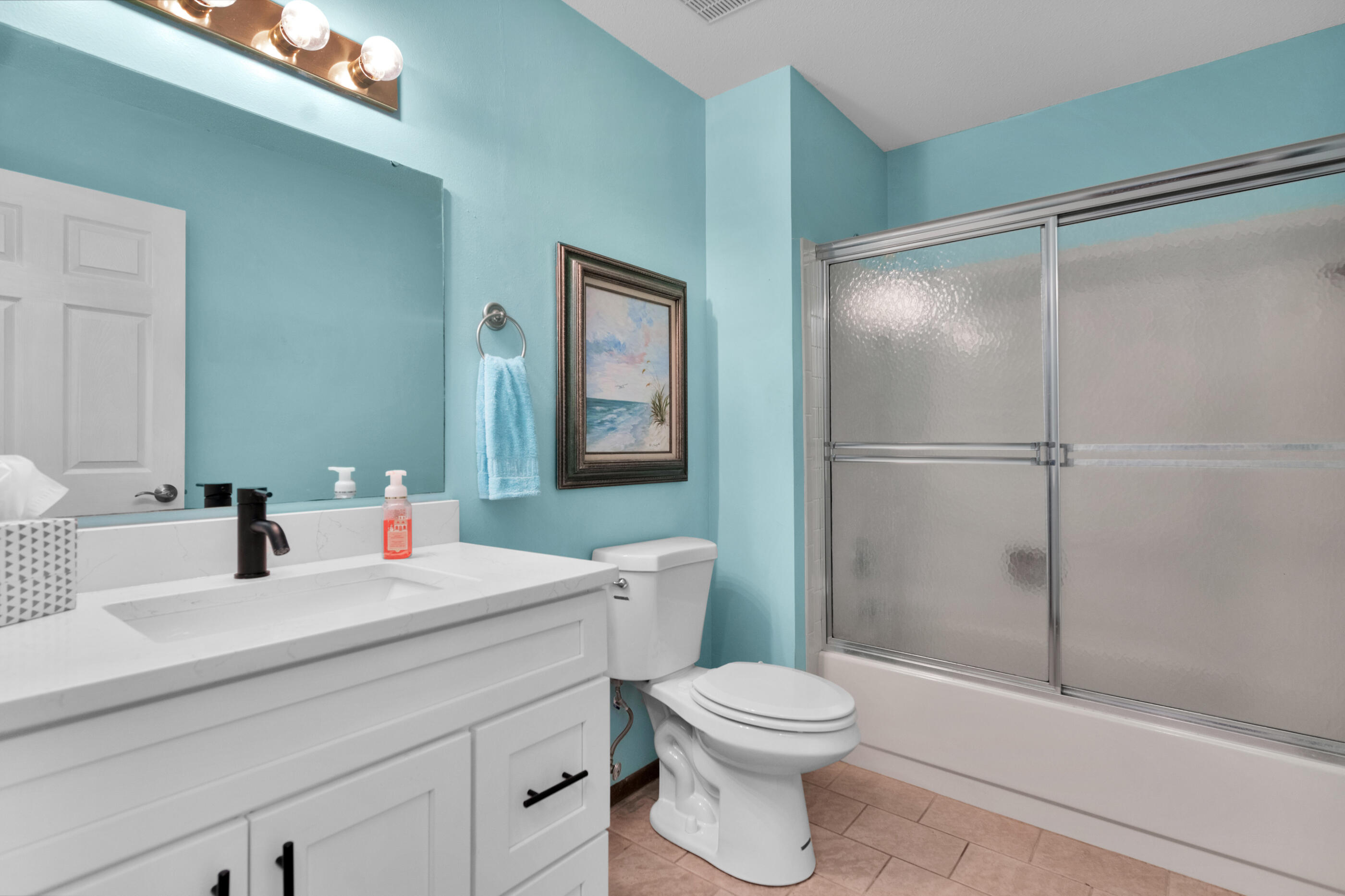 371 Echo Circle Fort Walton Beach, FL 32548 - Photo 23 of 36 a bathroom with a sink toilet and shower