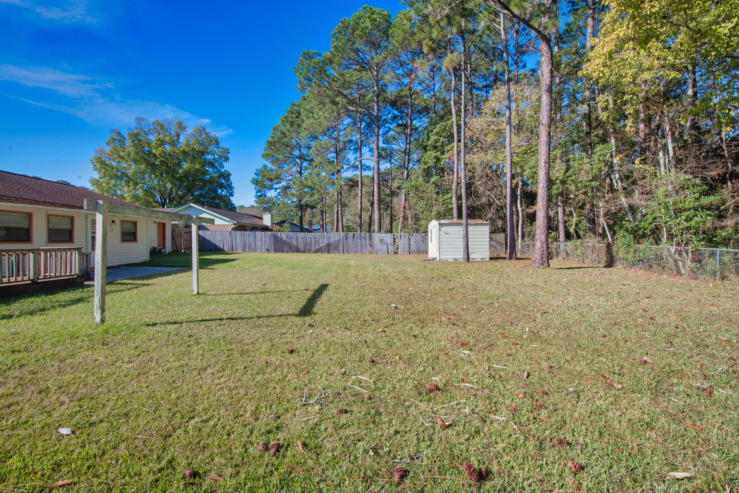 371 Echo Circle Fort Walton Beach, FL 32548 - Photo 33 of 36 a view of a house with a yard