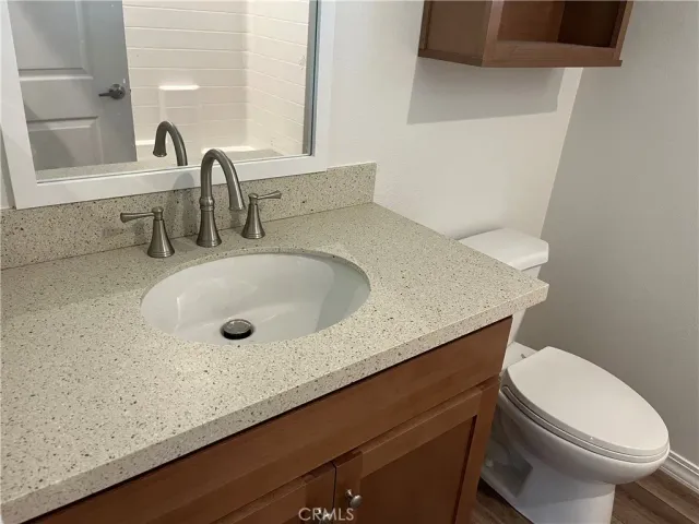 a bathroom with a sink and a toilet