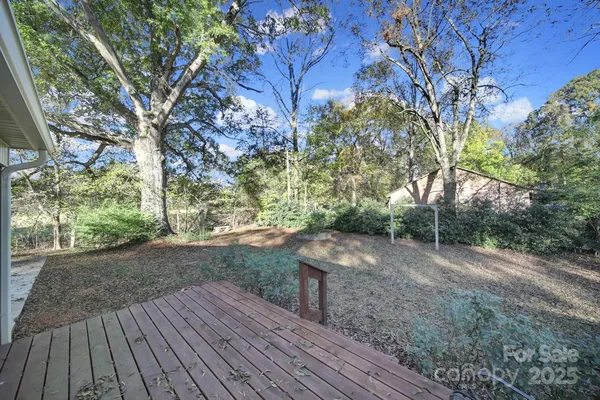 a view of backyard with green space
