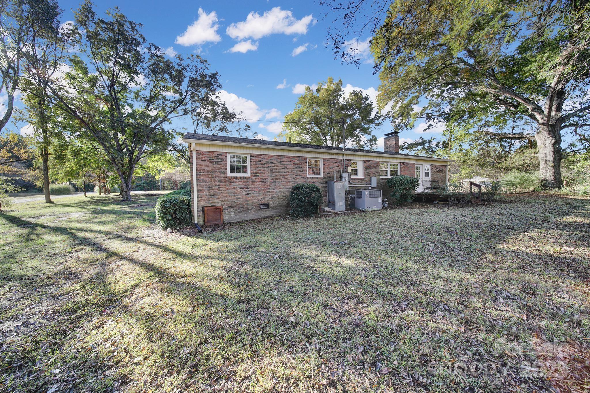 3987 Taxahaw Road Lancaster, SC 29720 - Photo 3 of 29 a view of a house with a back yard