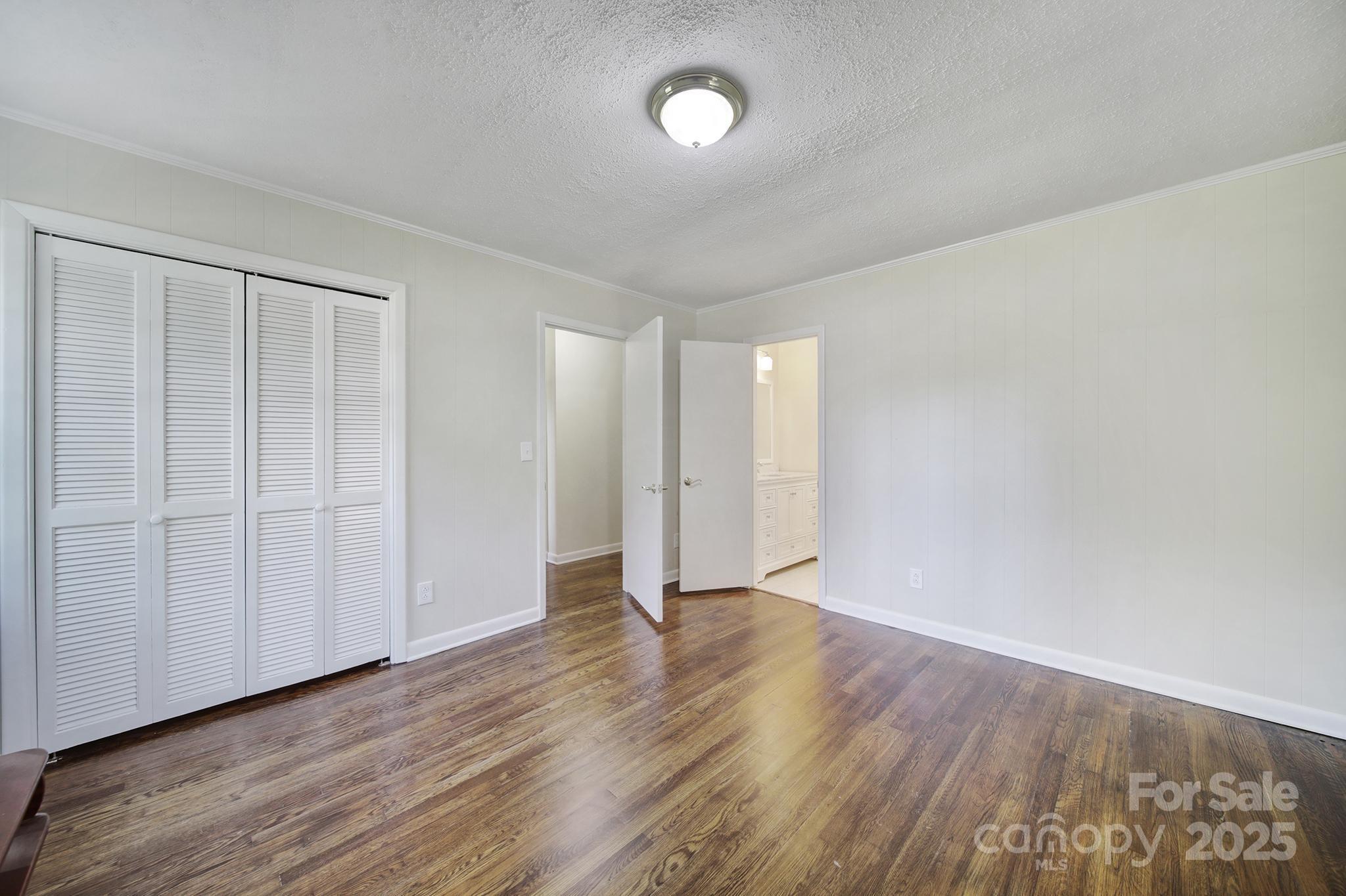 3987 Taxahaw Road Lancaster, SC 29720 - Photo 7 of 29 a view of an empty room with wooden floor