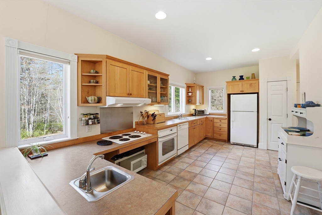 110 Turkey Hill Road Northampton, MA 01062 - Photo 11 of 42 a kitchen with a sink appliances and cabinets