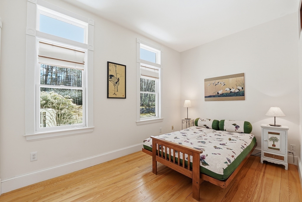 110 Turkey Hill Road Northampton, MA 01062 - Photo 12 of 42 a bedroom with a bed window and a table