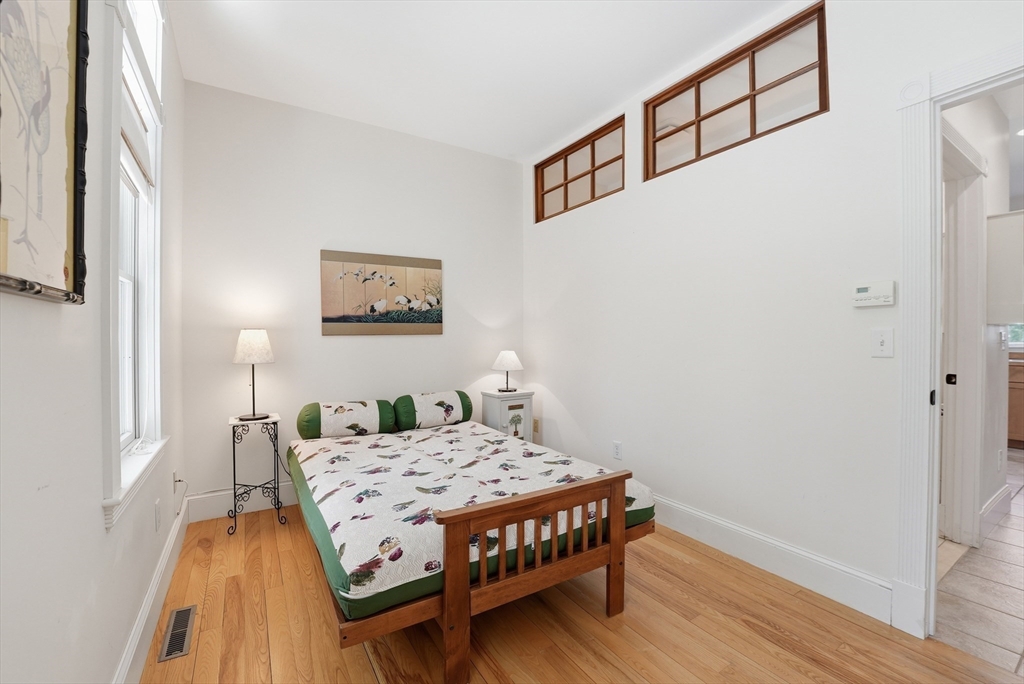 110 Turkey Hill Road Northampton, MA 01062 - Photo 13 of 42 a bedroom with a bed and a table in it