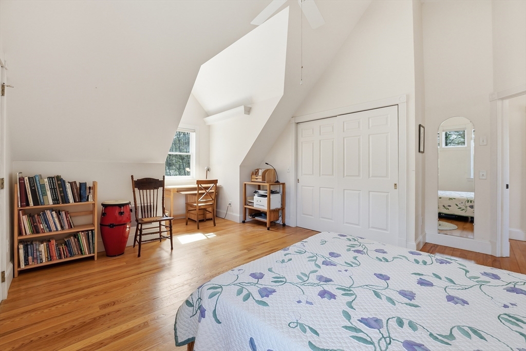 110 Turkey Hill Road Northampton, MA 01062 - Photo 19 of 42 a view of a bedroom with furniture and wooden floor