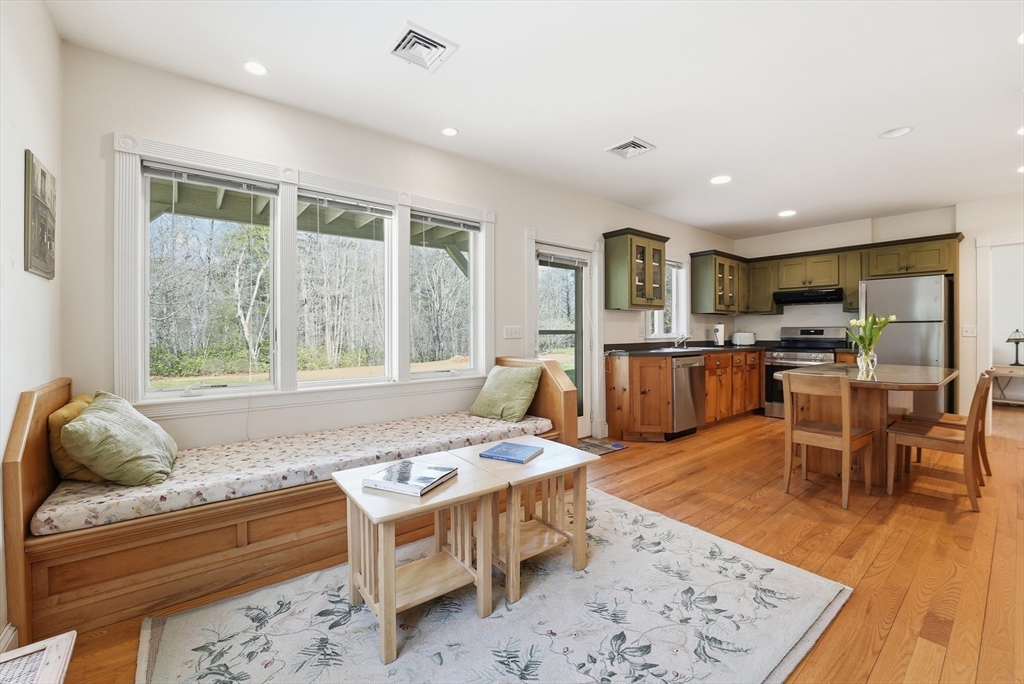 110 Turkey Hill Road Northampton, MA 01062 - Photo 21 of 42 a living room with furniture and a table