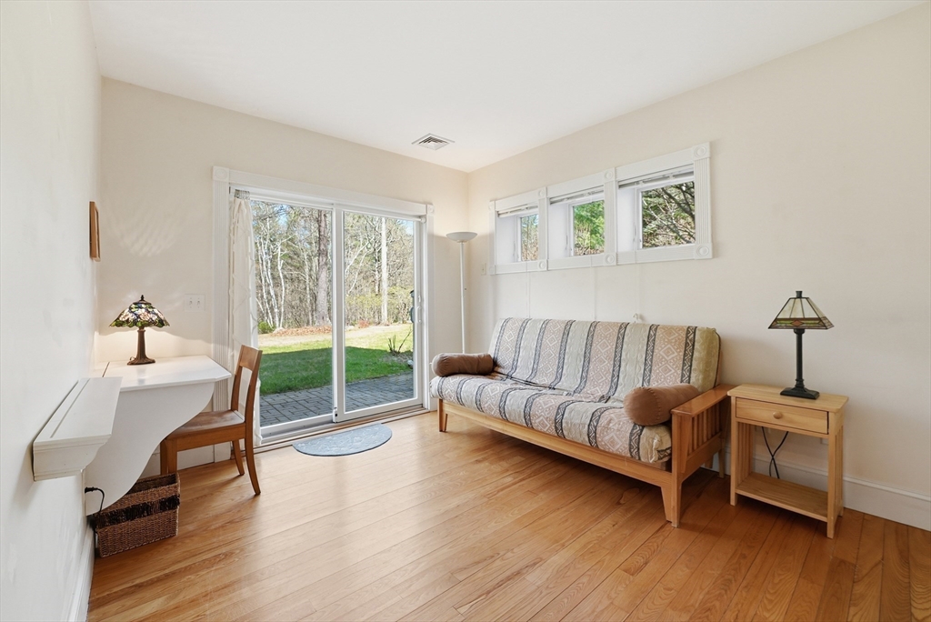 110 Turkey Hill Road Northampton, MA 01062 - Photo 27 of 42 a living room with furniture and a wooden floor