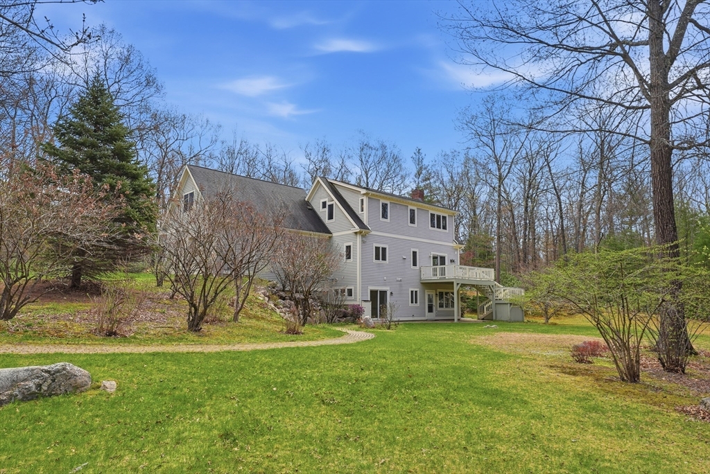 110 Turkey Hill Road Northampton, MA 01062 - Photo 29 of 42 a view of a house with a yard