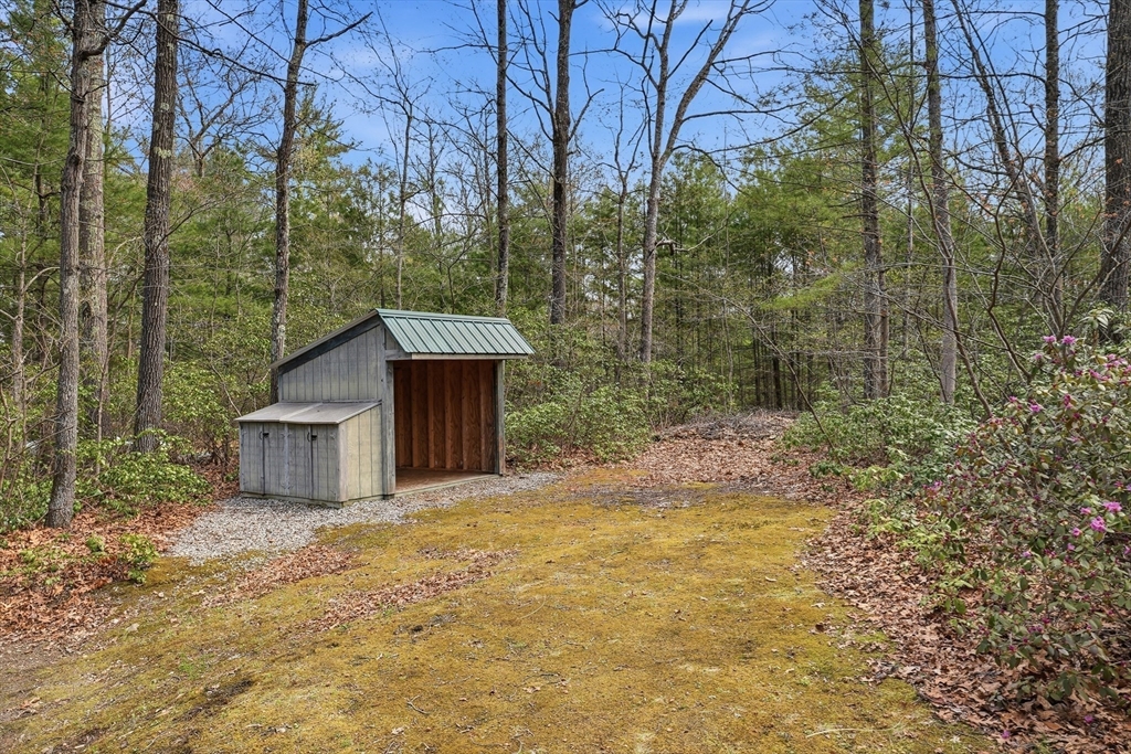 110 Turkey Hill Road Northampton, MA 01062 - Photo 31 of 42 a view of a house with a yard