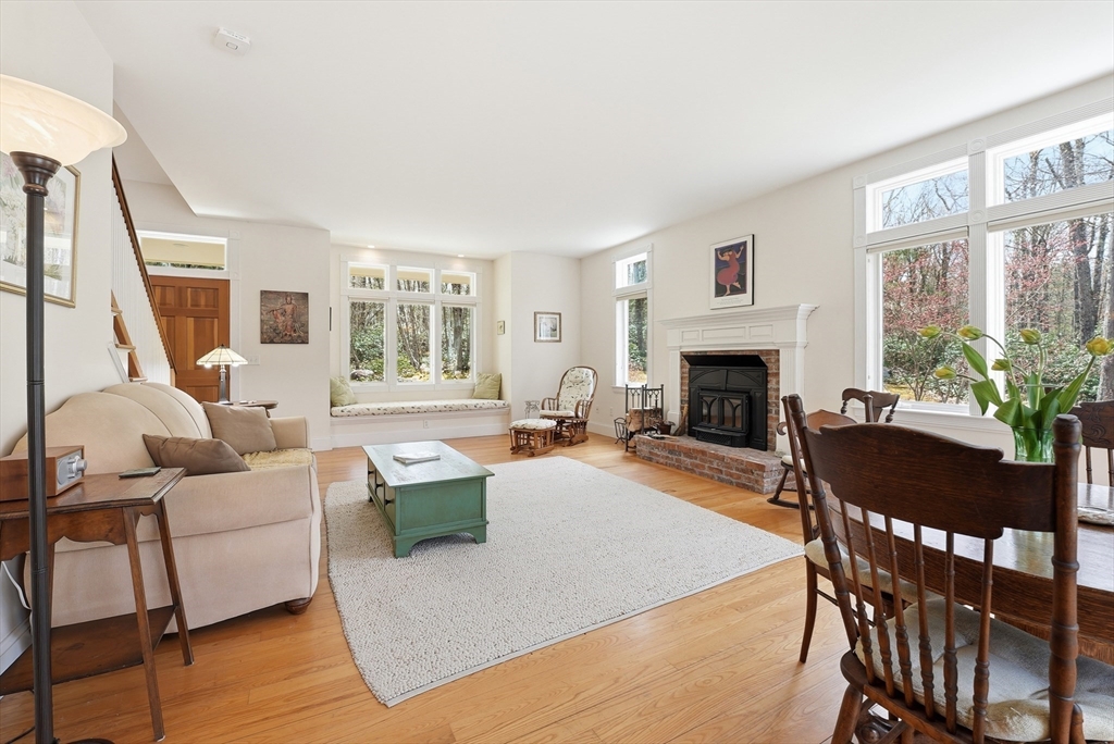 110 Turkey Hill Road Northampton, MA 01062 - Photo 7 of 42 a living room with furniture fireplace and a large window