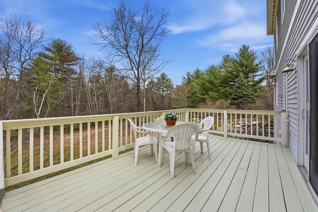 110 Turkey Hill Road Northampton, MA 01062 - Photo 10 of 42 a view of balcony with wooden floor and fence