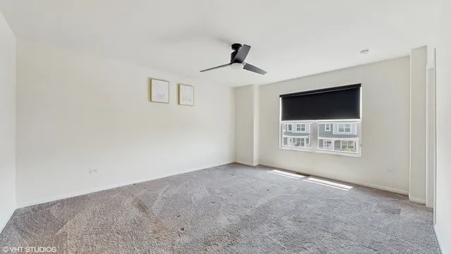 a bathroom with a bathtub sink and mirror