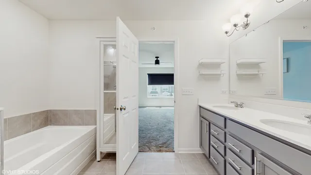 a view of a room with air conditioner and window