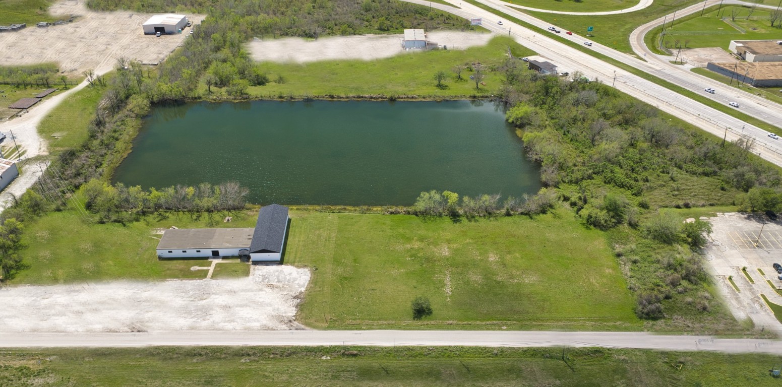 238 Johnson Cook Road Clute, TX 77531 - Photo 26 of 40 a view of a swimming pool with a yard