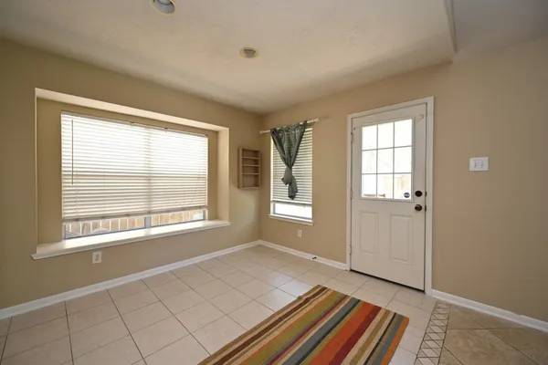 $385,000 | 219 North Wimberly Way, The Woodlands, TX 77385