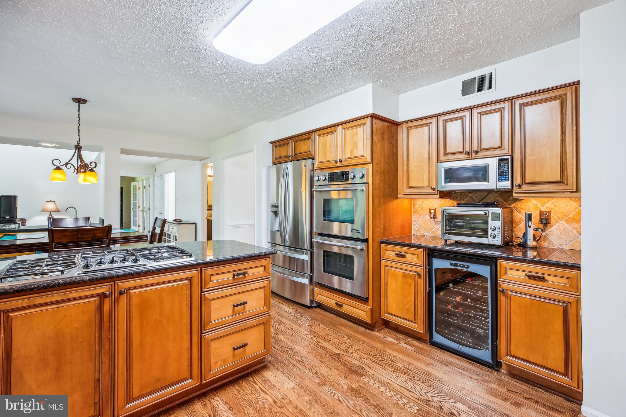 13468 Bregman Road Silver Spring, MD 20904 - Photo 9 of 58 Kitchen with granite and stainless steel appliance