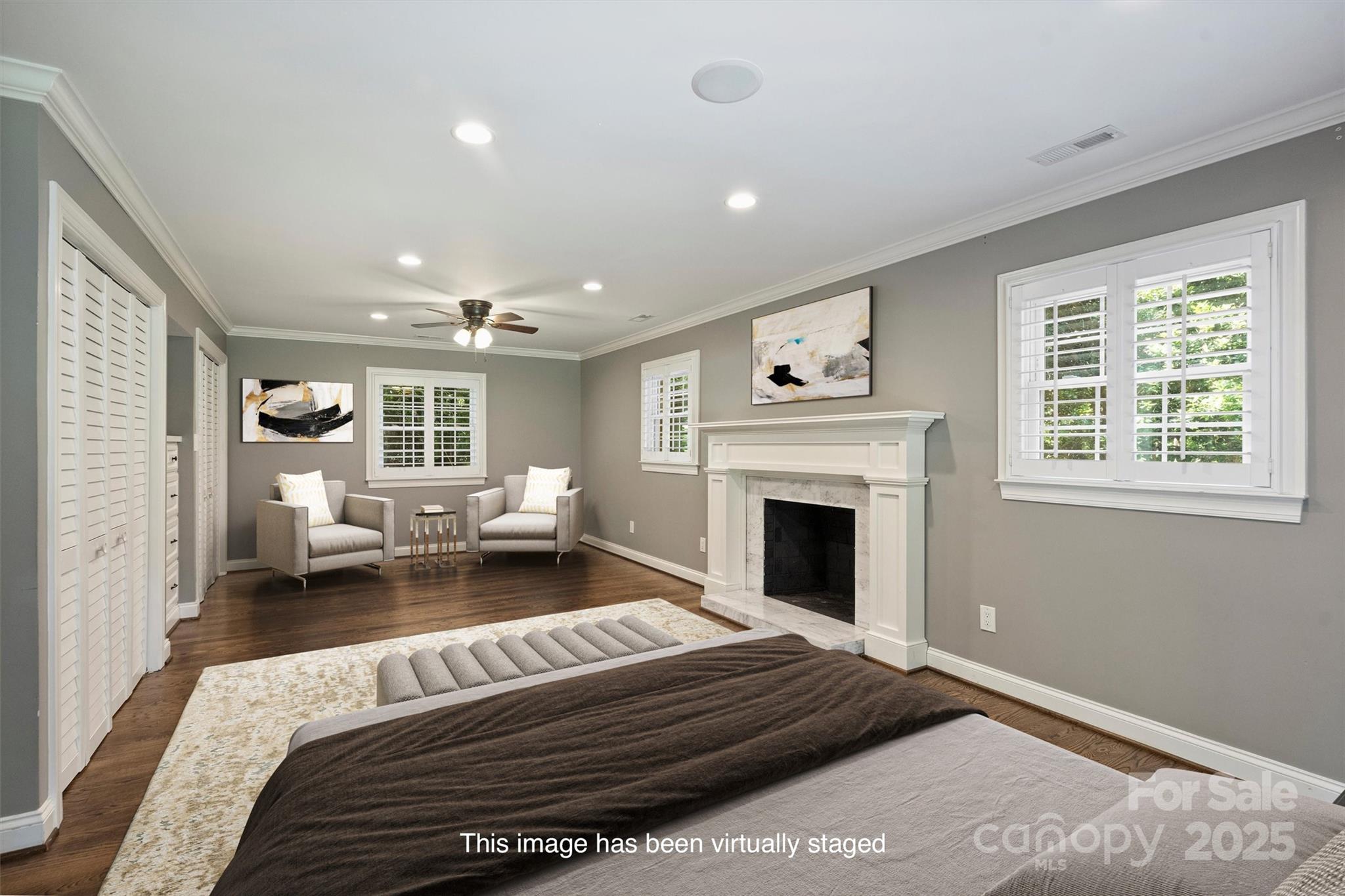 1008 Dumbarton Road Gastonia, NC 28054 - Photo 23 of 40 a spacious bedroom with a large bed and a fireplace