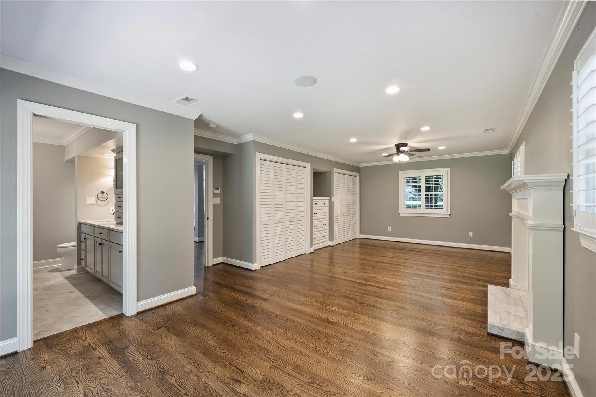 1008 Dumbarton Road Gastonia, NC 28054 - Photo 26 of 40 a view of empty room with wooden floor and windows