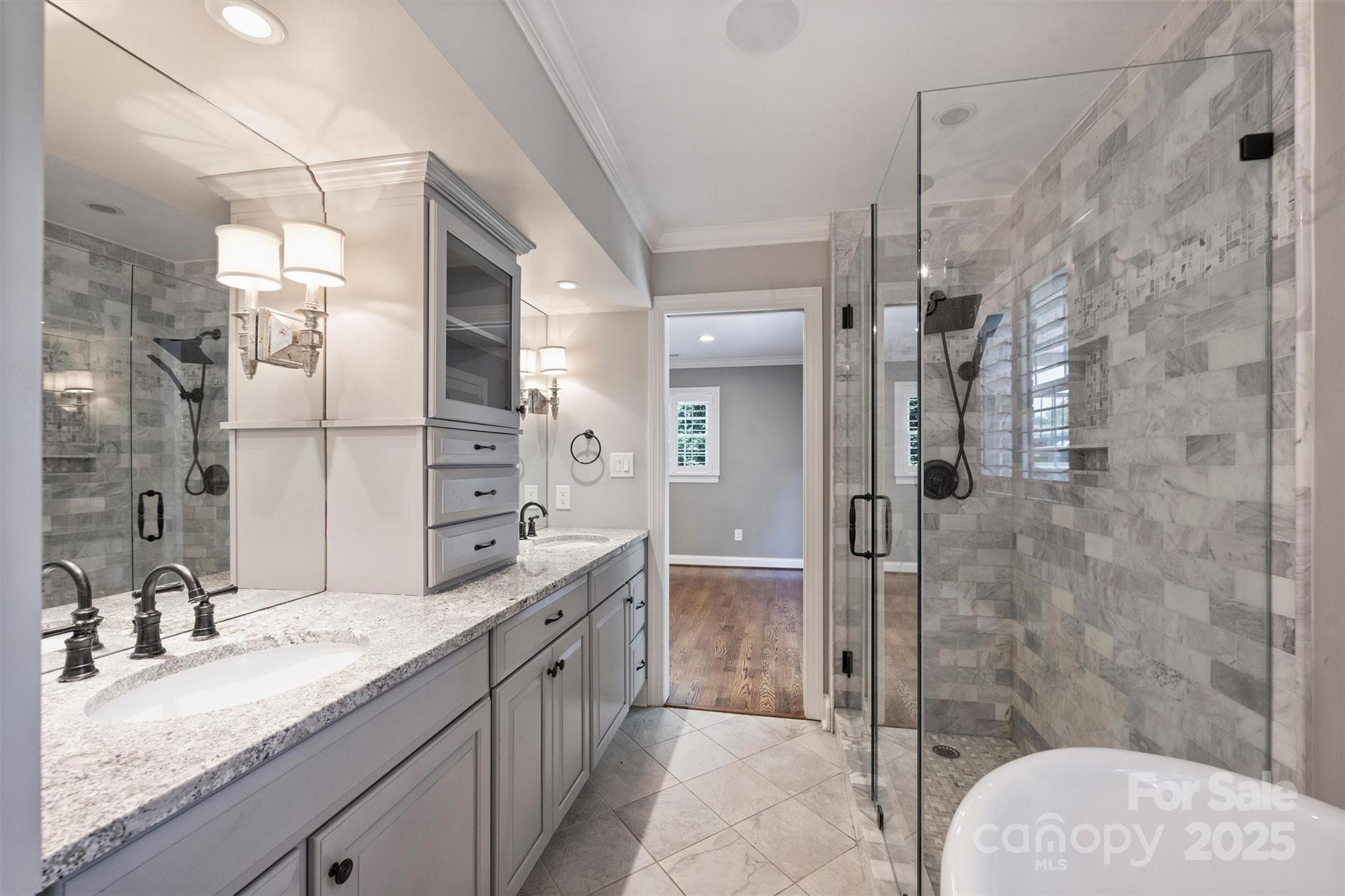1008 Dumbarton Road Gastonia, NC 28054 - Photo 27 of 40 a bathroom with a granite countertop sink mirror and shower
