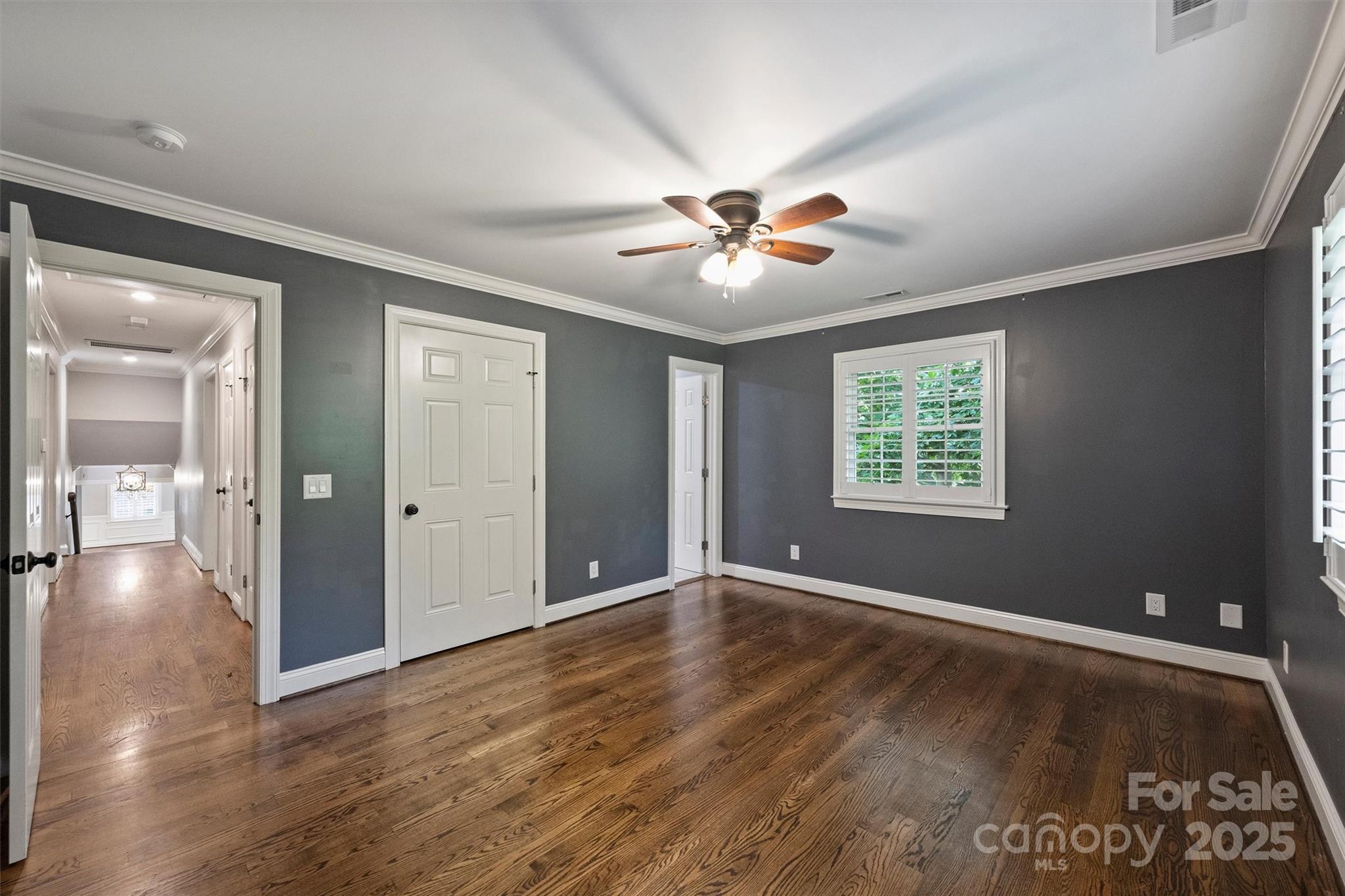 1008 Dumbarton Road Gastonia, NC 28054 - Photo 30 of 40 an empty room with wooden floor and windows